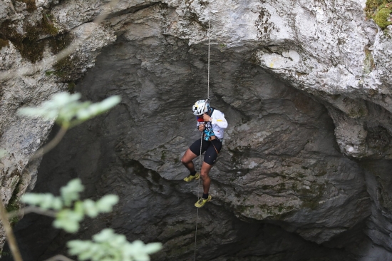 Descending into the sink hole of Jama Vrtlina