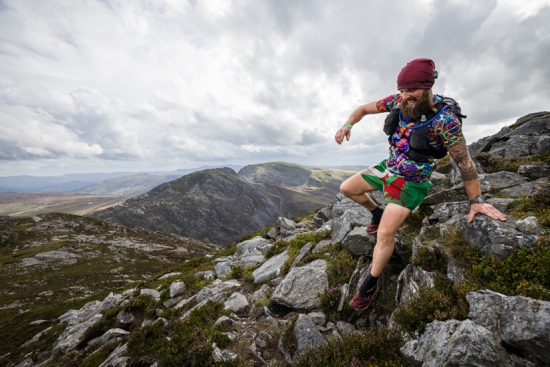 Welshman Ian Owen was a colourful sight on day two of the 2022 Montane Dragon's Back Race
